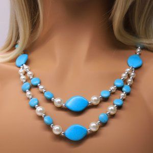 Necklace with Turquoise and silver chain.